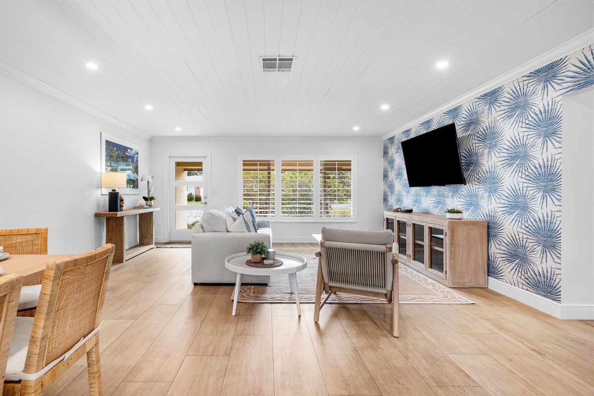 Unwind in a bright, airy lounge designed with natural textures, plush seating, and a calming palette that reflects the nearby shoreline.