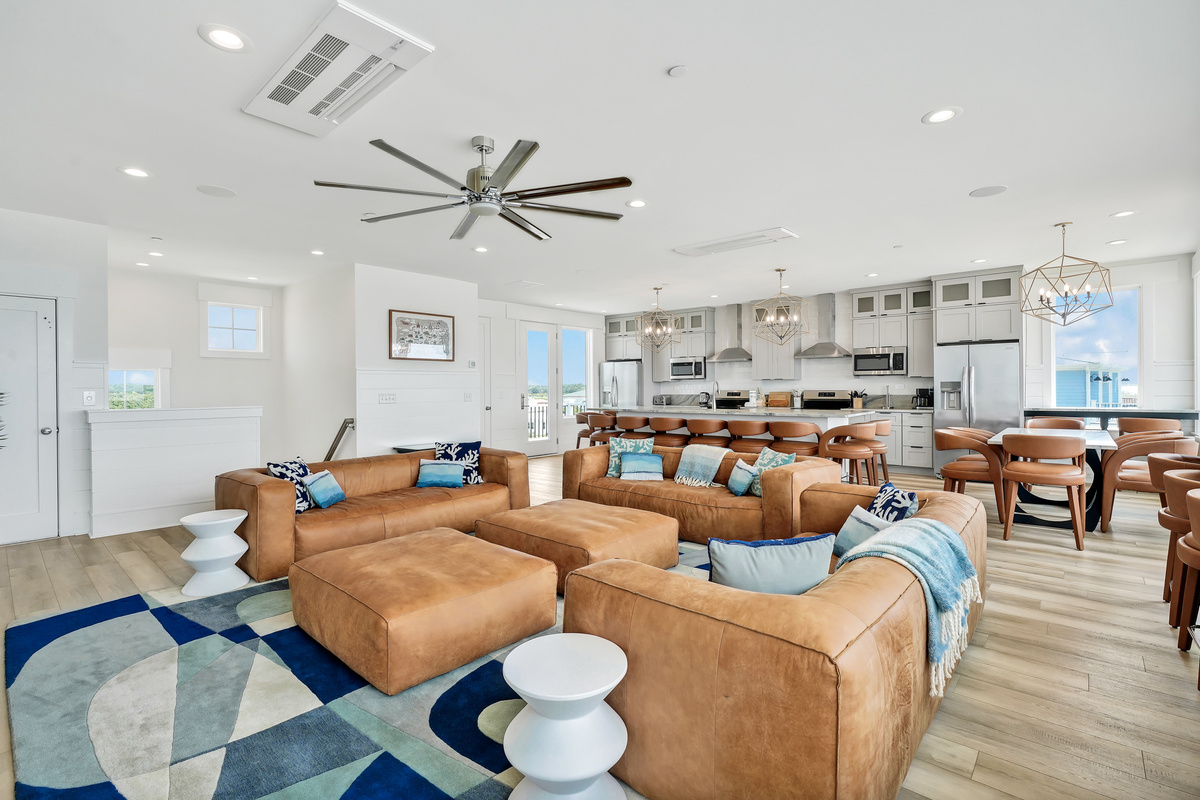 The third floor has a kitchen with a great room for all your family and friends