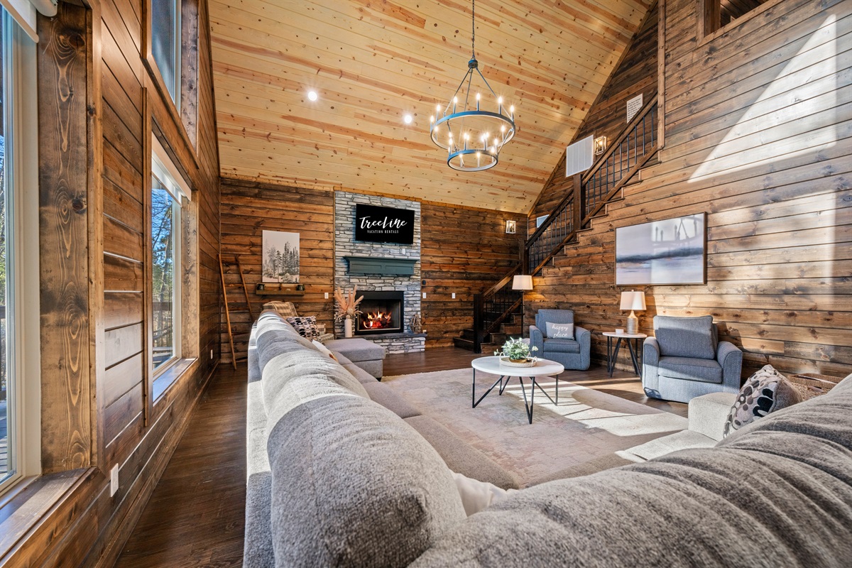 From this angle you can really see how bright and welcoming the space is, with beautiful woodwork, comfortable furniture, and that classic lodge-style charm.