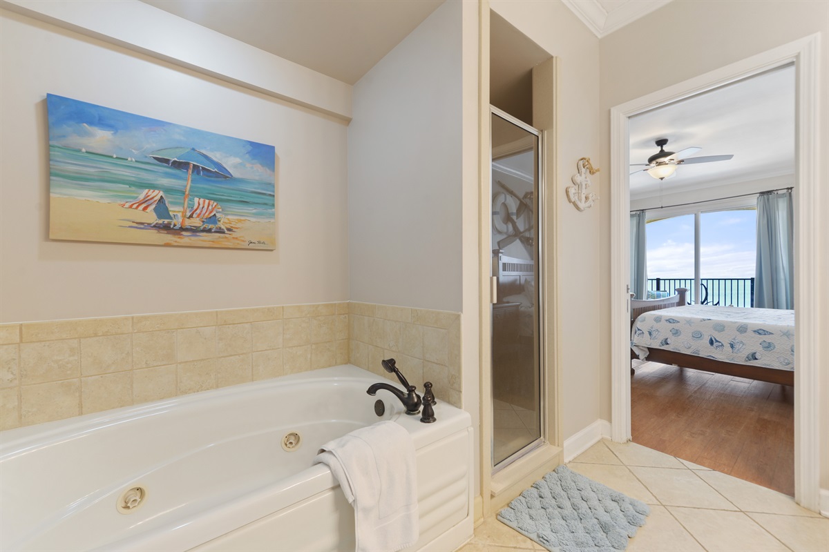 Primary berdoom en-suite bathroom features walk in shower, tub, dual vanity, separate water closet.