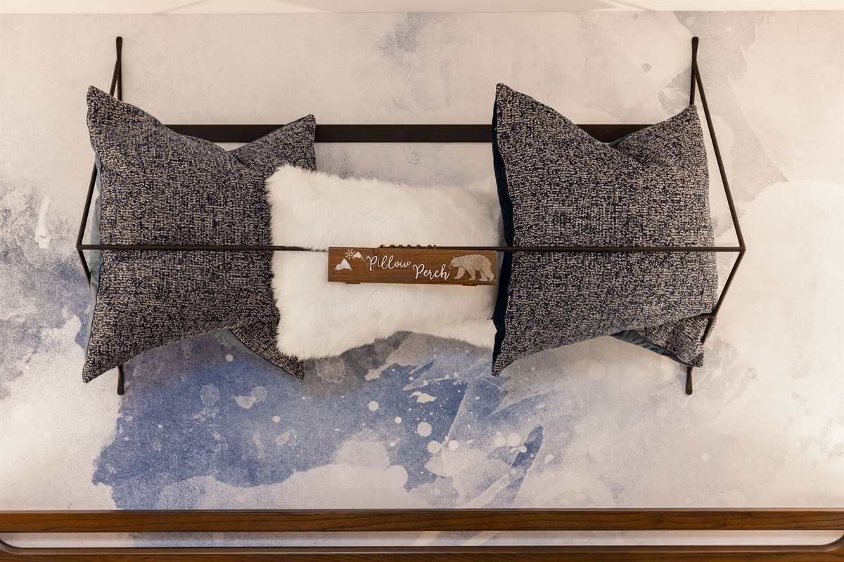 Our custom designed pillow perch is an out of the way place to store all the pillows!