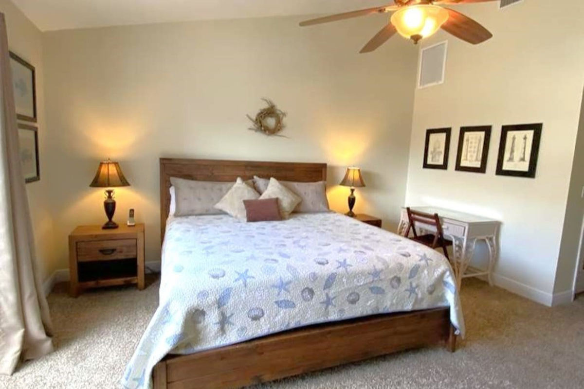 Your king suite: Gulf-view balcony, garden tub, walk-in closet, dedicated desk. Step in and make it yours for the week.