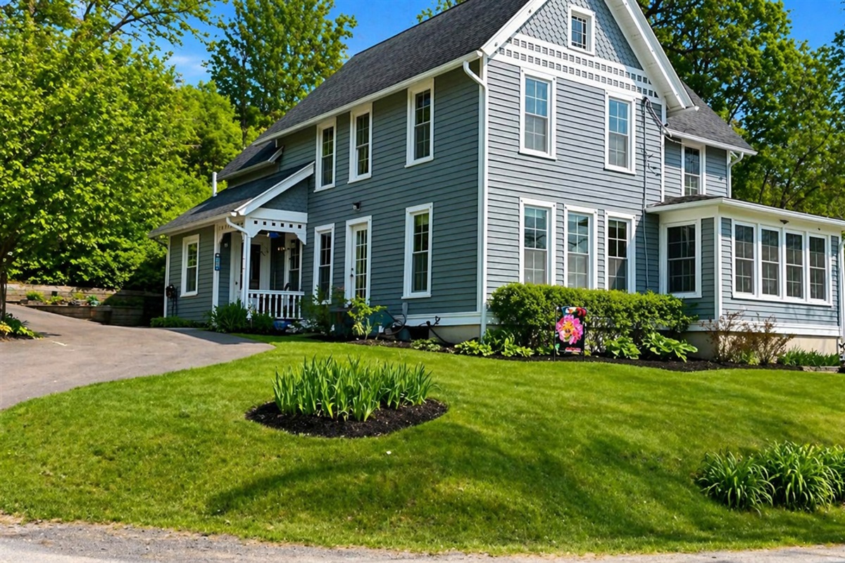 This beautifully maintained home offers a perfect mix of historic charm and modern comfort. Nestled in nature with a welcoming front porch, it’s an ideal retreat! 