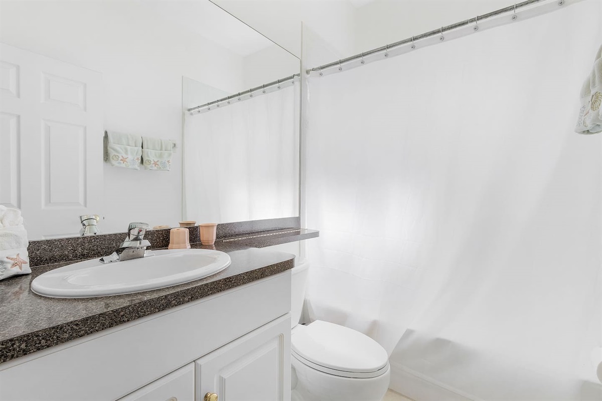 2nd guest bathroom with a versatile shower/tub combo for ultimate convenience!