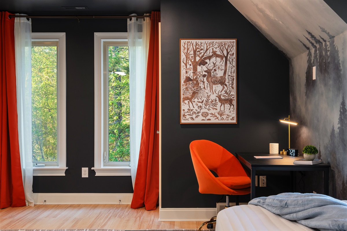 Bedroom with bold accents and natural light - consistent design and comfort across every room