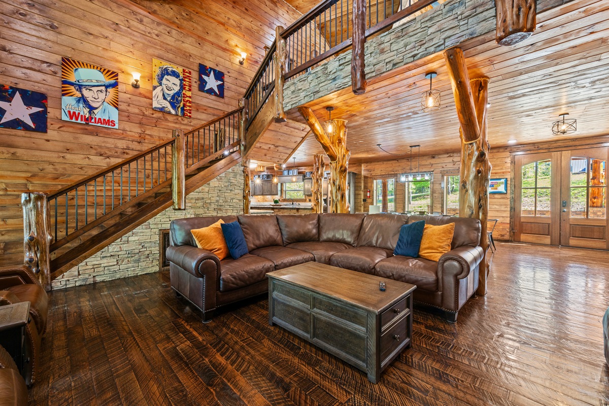 With high ceilings and an open layout, this spacious living room offers plenty of seating for the whole group to spread out and enjoy.