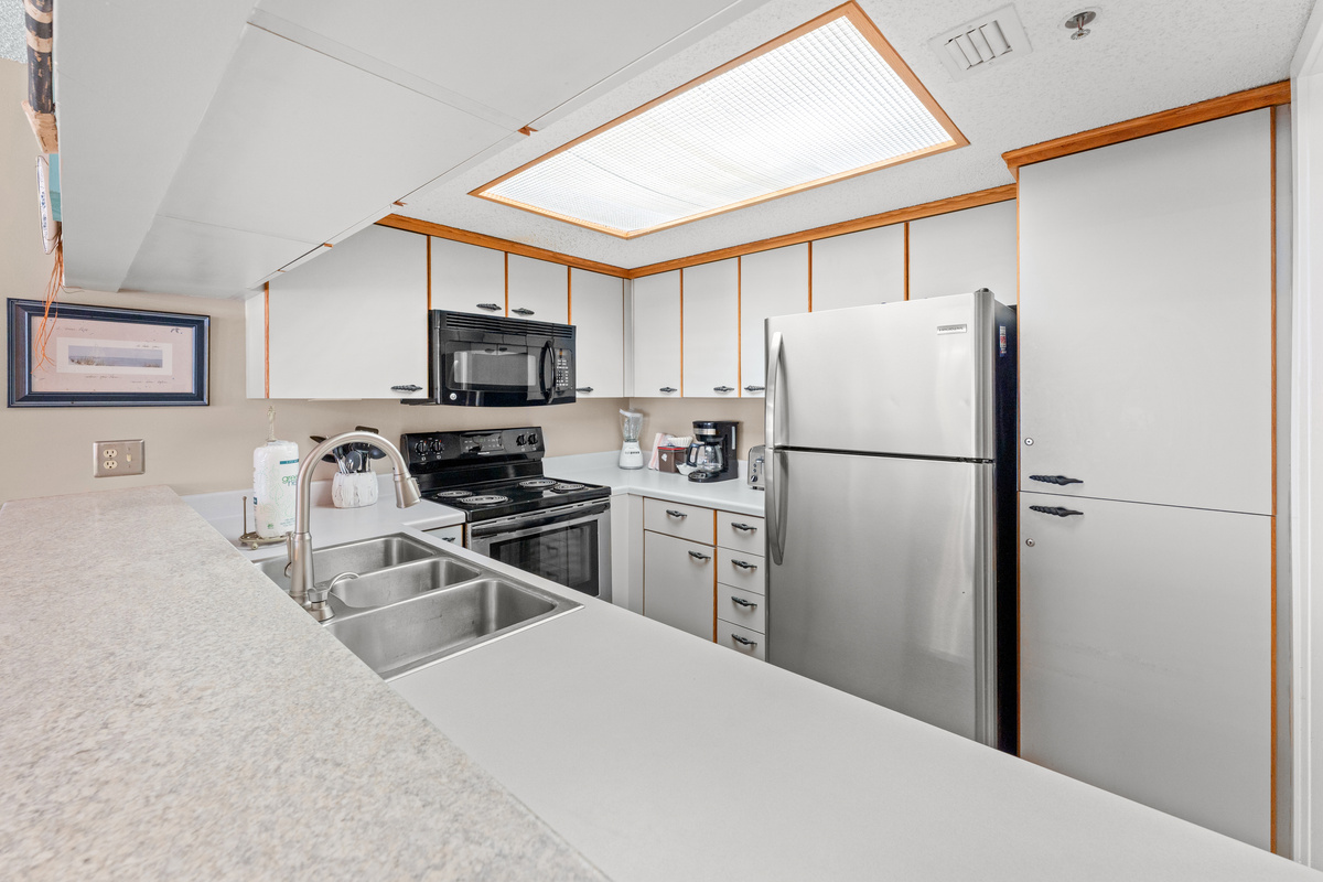 Well appointed kitchen with stainless steel appliances 