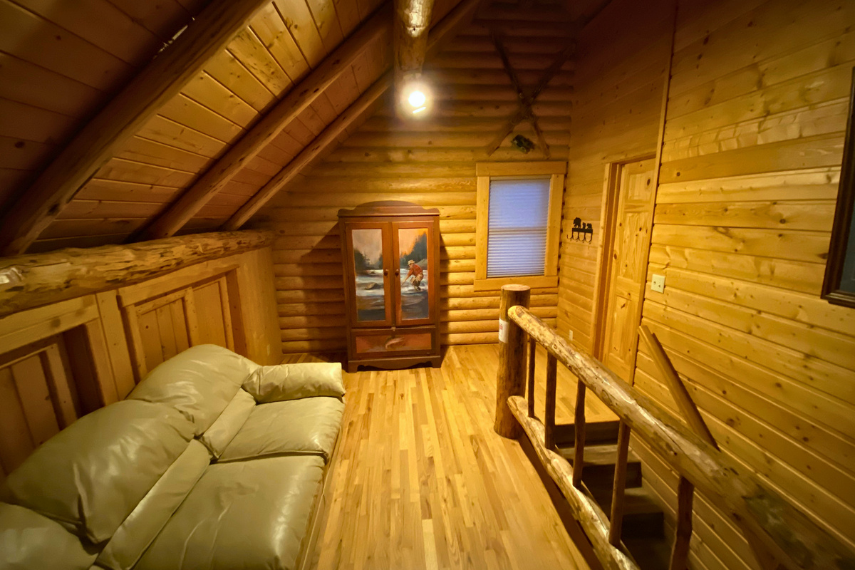 Upper loft with additional seating.