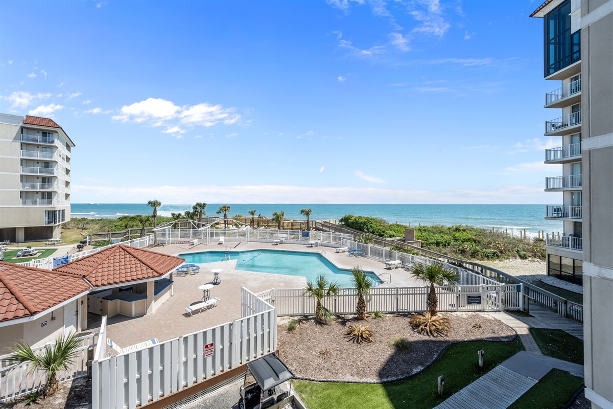 Resort-style pool just steps from the beach access