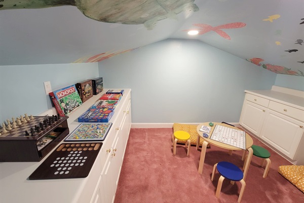 Game room set up with plenty of board games