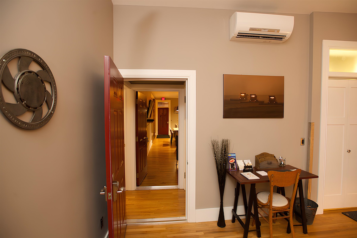 LIving area includes work area / door leads to laundry