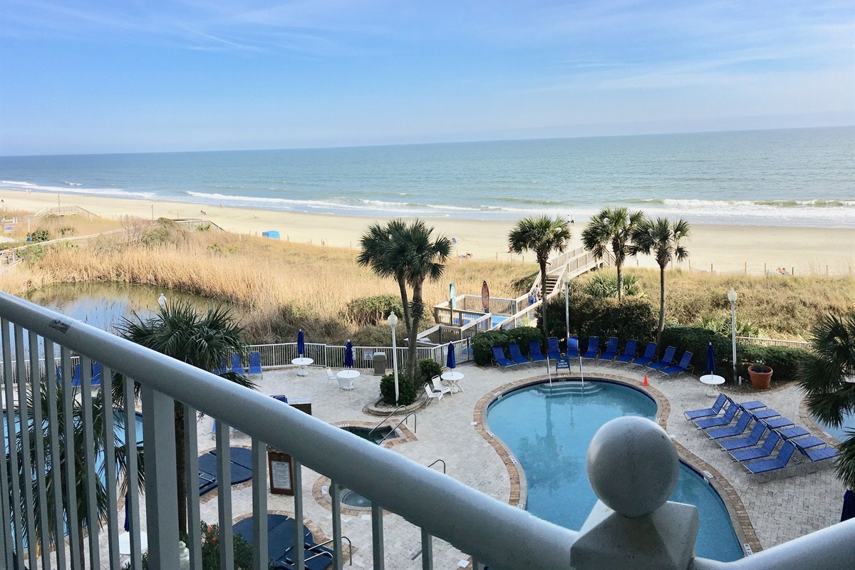 The oceanfront balcony overlooks the South Tower pools and hot tubs.