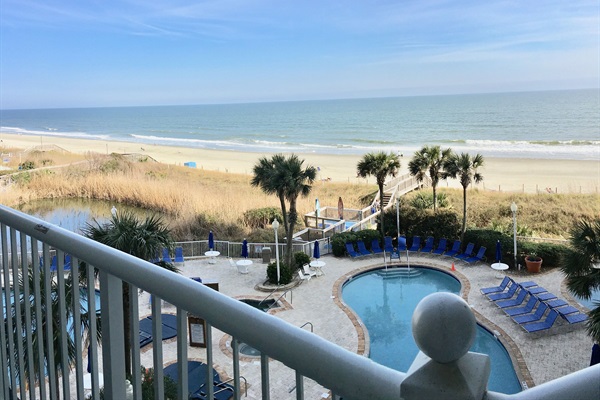 The oceanfront balcony overlooks the South Tower pools and hot tubs.