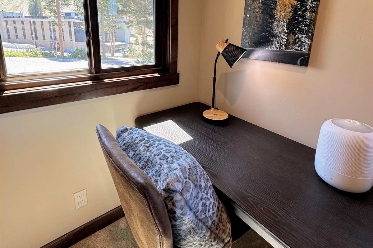 The dedicated workspace in the primary suite is built for focus—if you can take your eyes off the jaw-dropping views of Canyon Lodge and the gondola gliding by. Consider yourself warned: productivity may be optional.