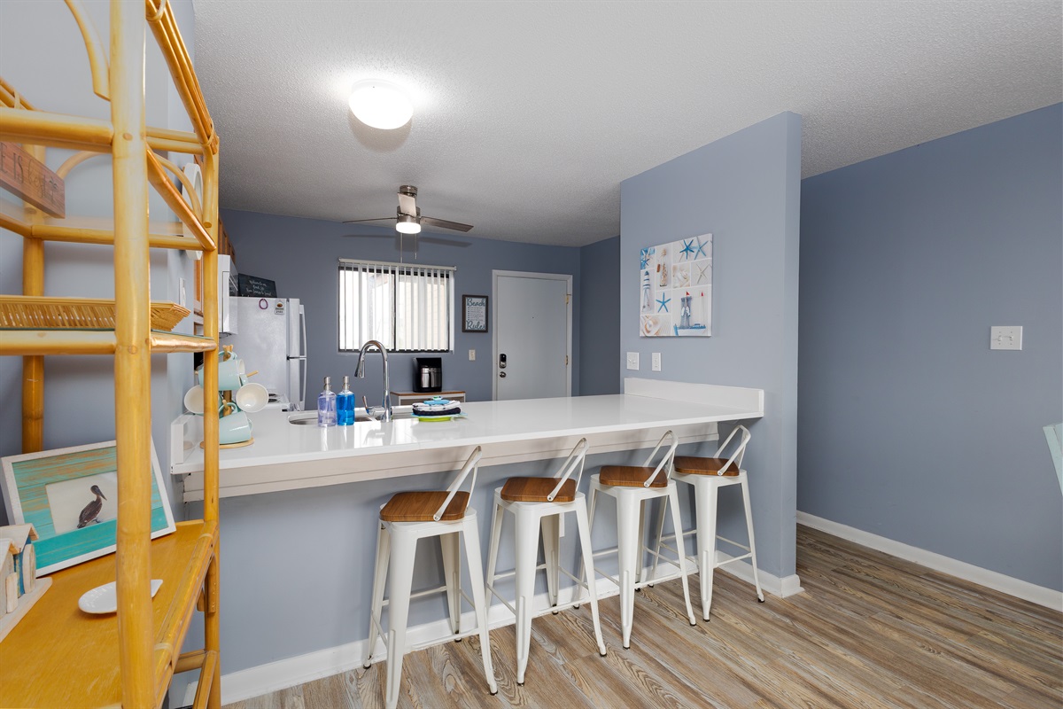 The kitchen's layout is open and functional