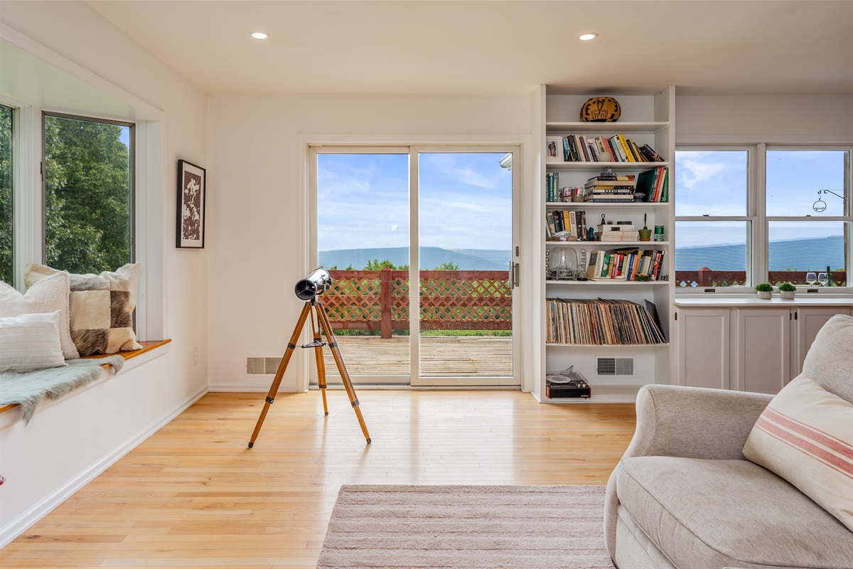 Take in breathtaking ridge views from the comfort of your living room or step onto the deck for an even better look