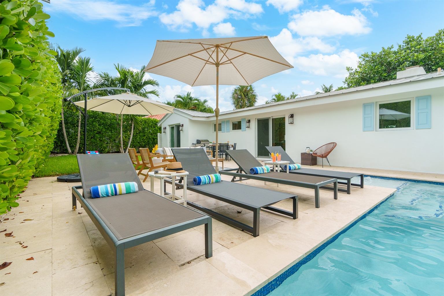 Private, outdoor heated pool and lounge area