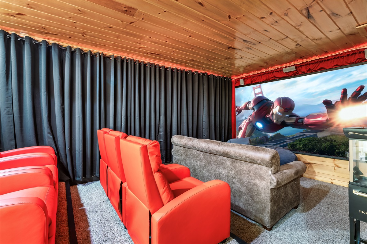 Large Screen projector theater with surround sound and real popcorn machine