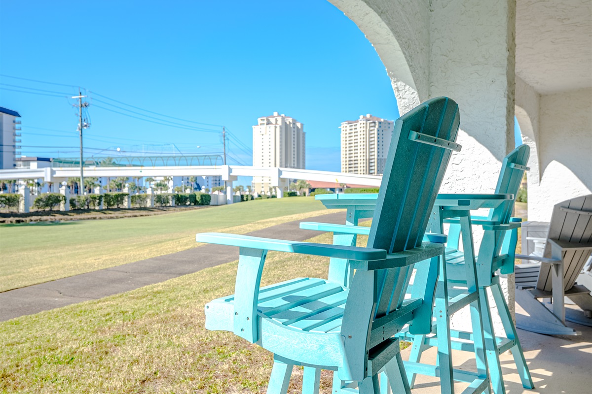 Bar height table and swivel chairs on the covered patio