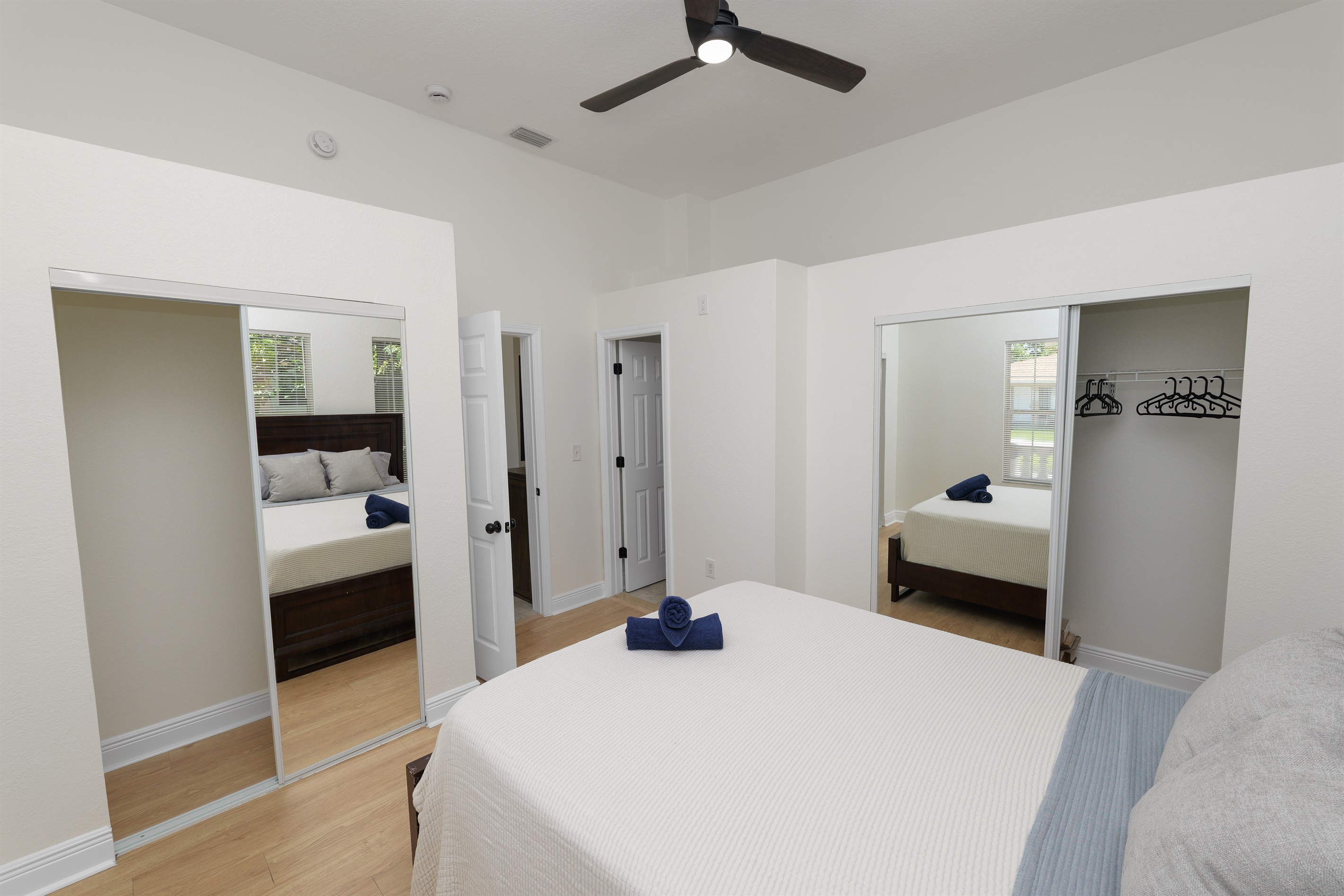 A clean design and cool-toned palette make this room ideal for guests who appreciate a calm and clutter-free space.