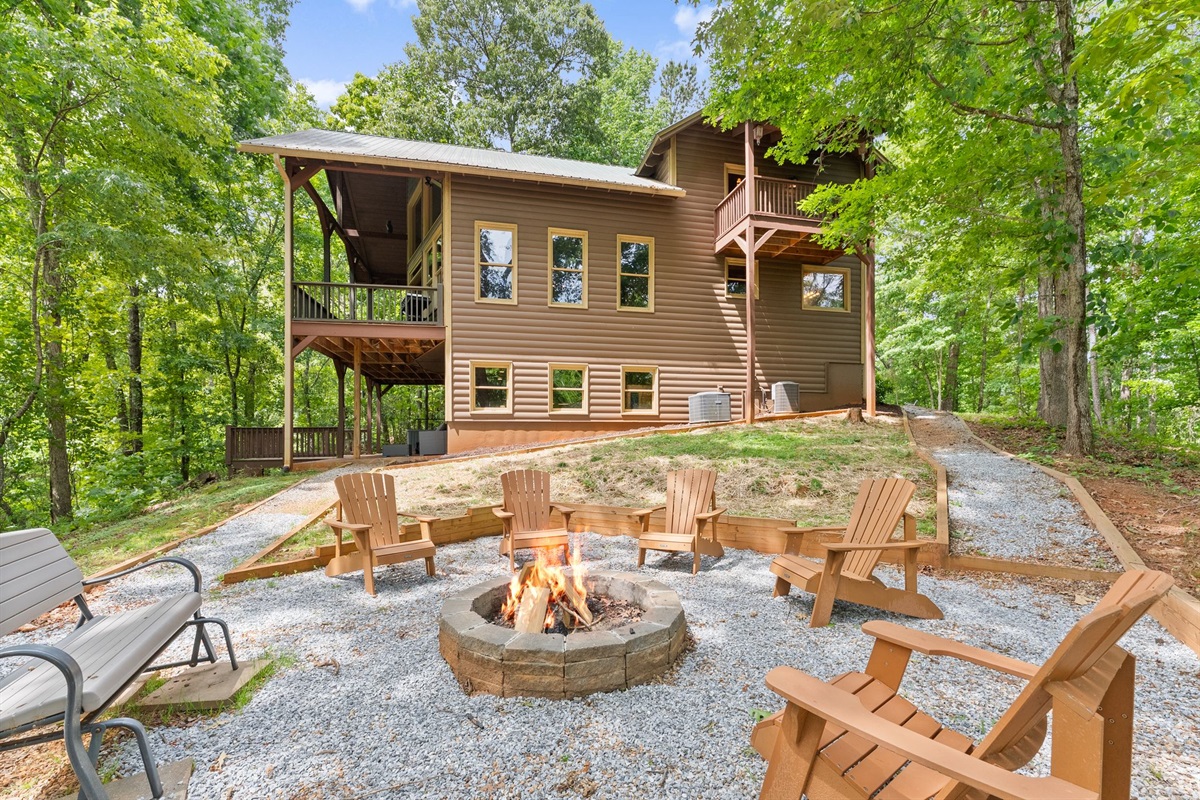 Charming cabin exterior with classic North Georgia mountain character.