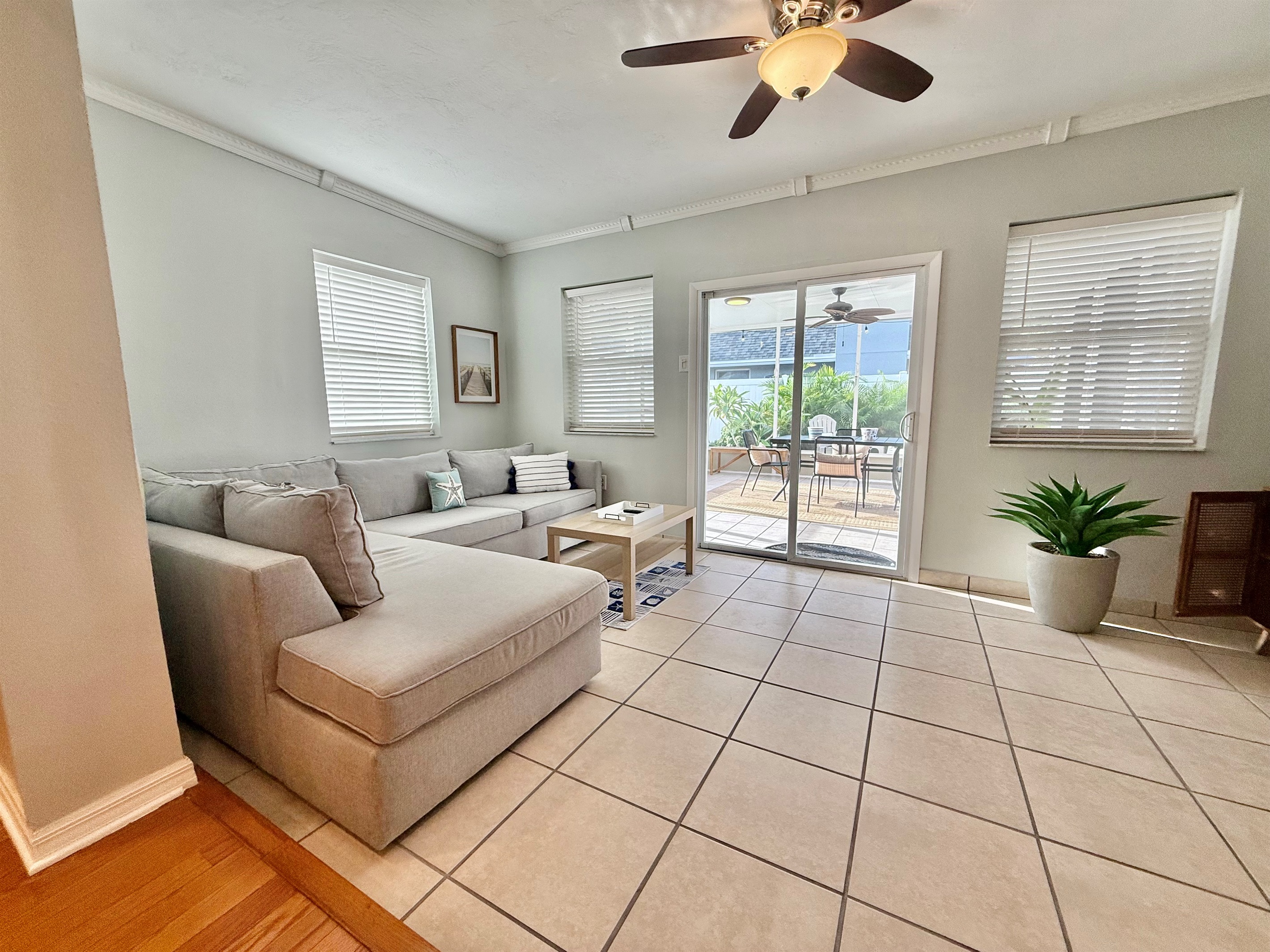 Kick back in comfort after a day of exploring—the space is tailored for relaxation with a large TV, soft lighting, and comfortable seating.