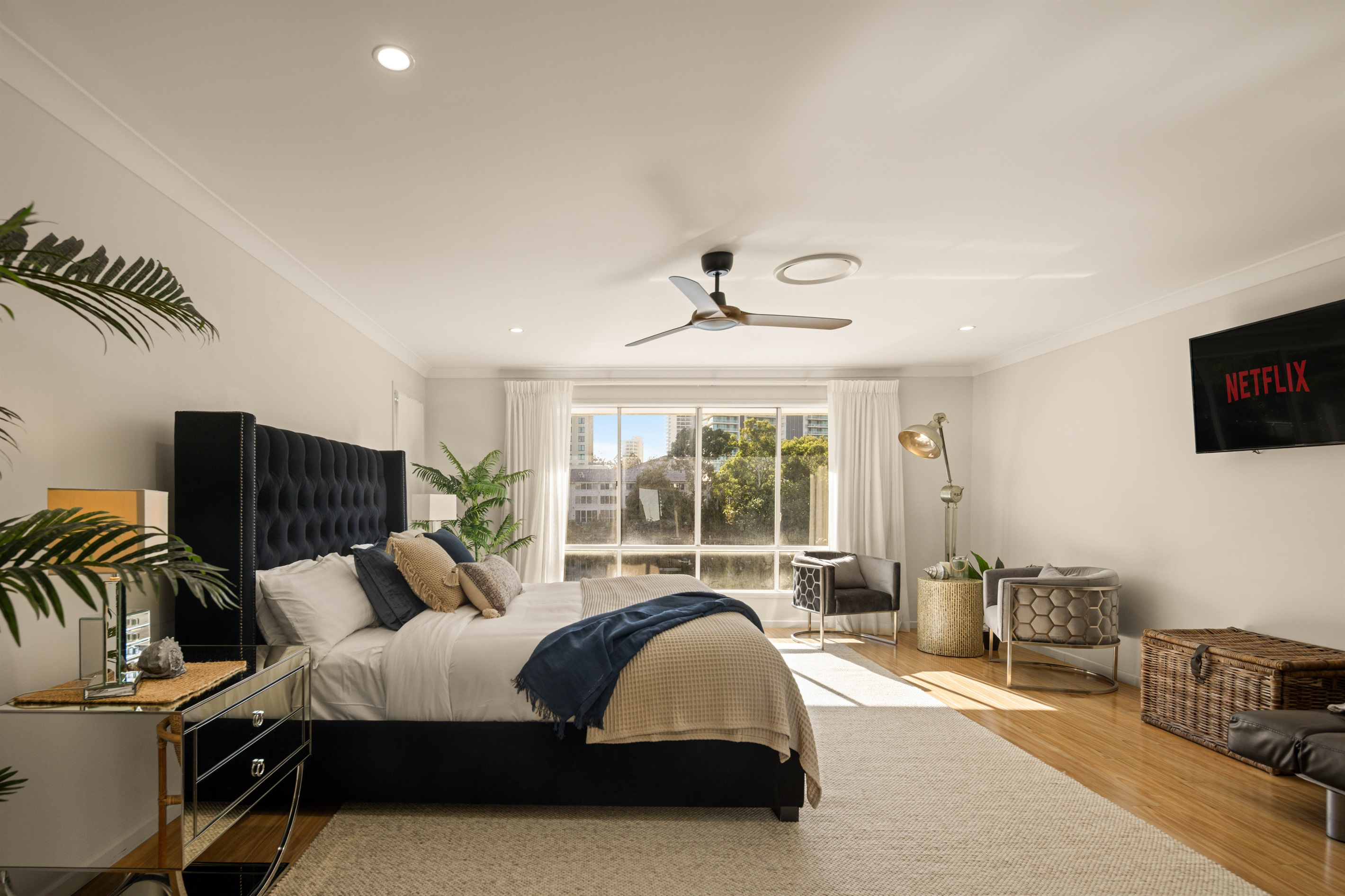 Expansive Master Suite with serene outlook and private retreat atmosphere.