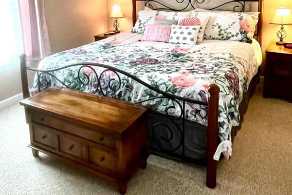Master 1st bedroom has King Bed, cable tv and a view of the lake