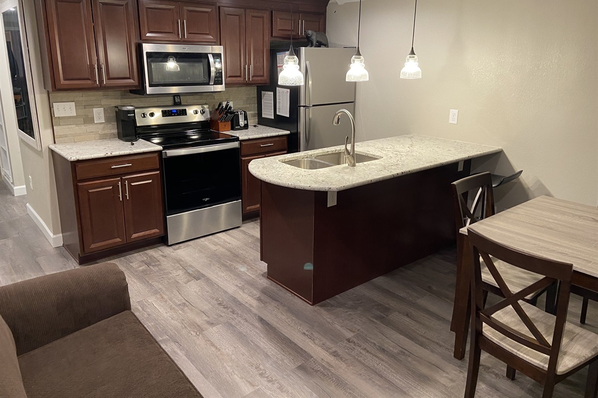 Our full kitchen is well stocked with all you need for cooking in. 