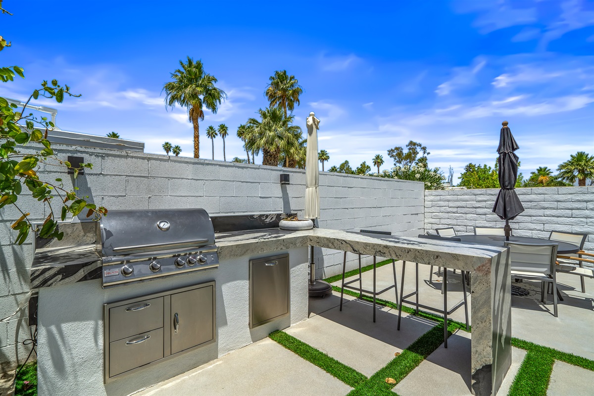 Outdoor kitchen with cocktail bar