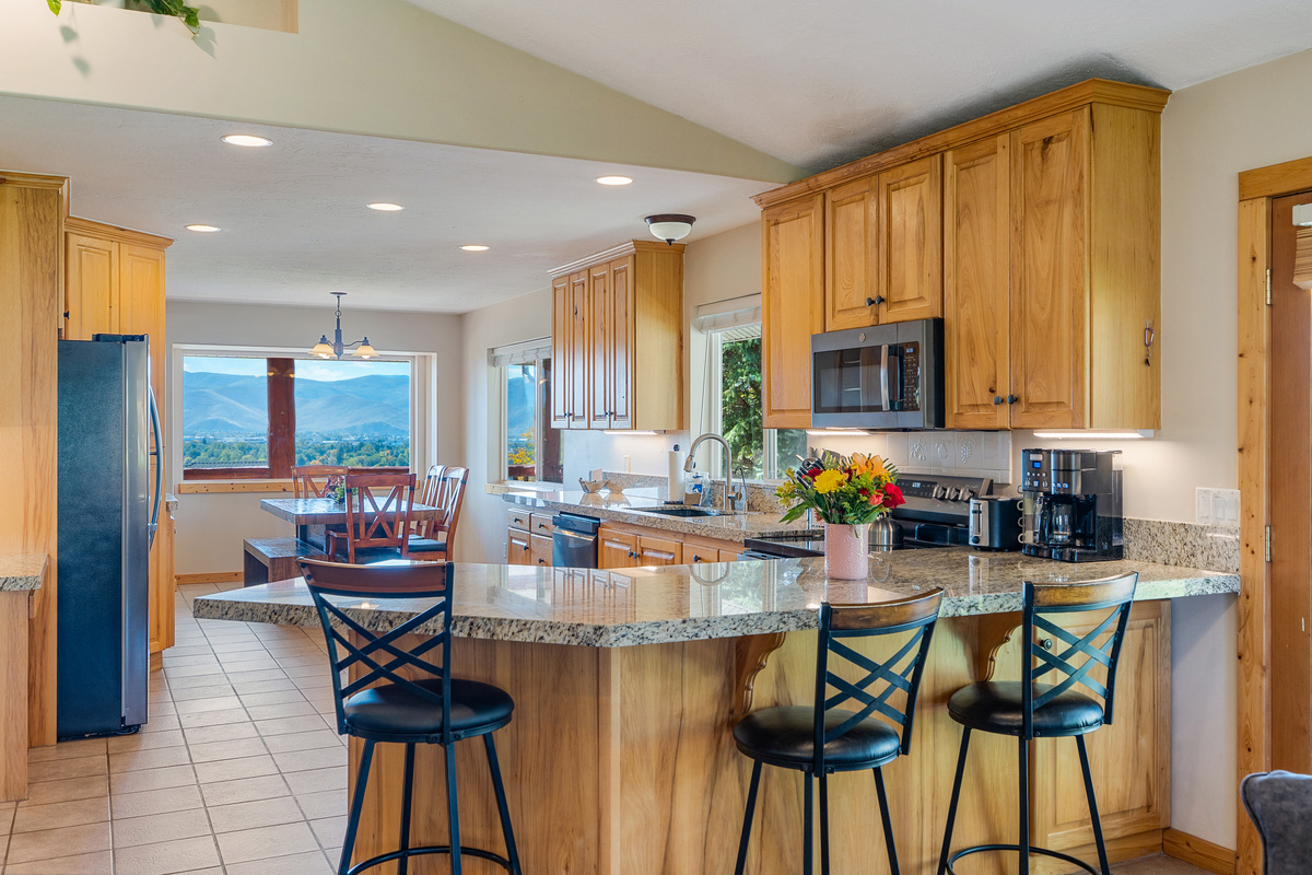 bar seating when it's a snack or morning cereal keeps kids and family close at all times. It's about being together!