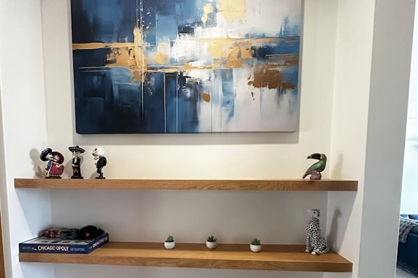 Explore the hall across from the guest bath, where you’ll find a delightful collection of board games, books, and binoculars for your entertainment and enjoyment.