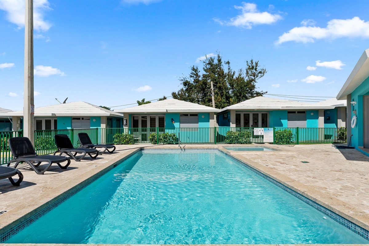 Poolside Paradise: Dive into relaxation beneath the sun with vibrant colors and lush surroundings!