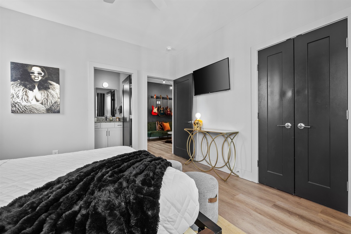 Bedroom Retreat: Modern sanctuary with stylish decor and a touch of Nashville's vibrant spirit!