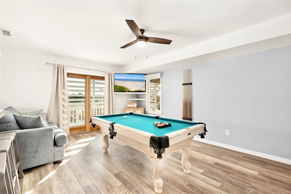 Game room, lower level, pool table, large smart TV, wet bar, full refrigerator, games