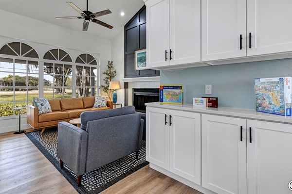 Board games and puzzles stocked in cabinets