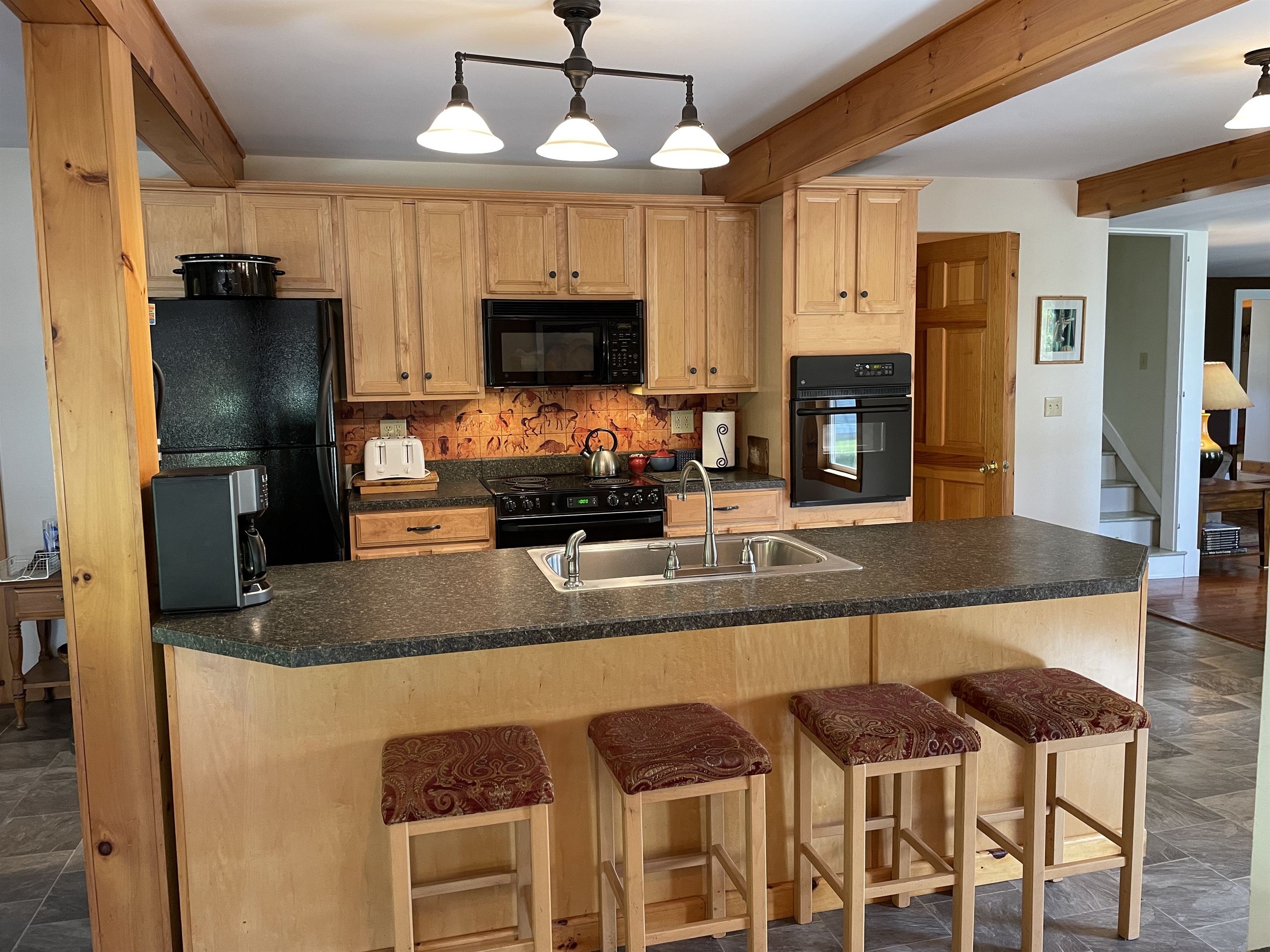 Kitchen area w/ island seating