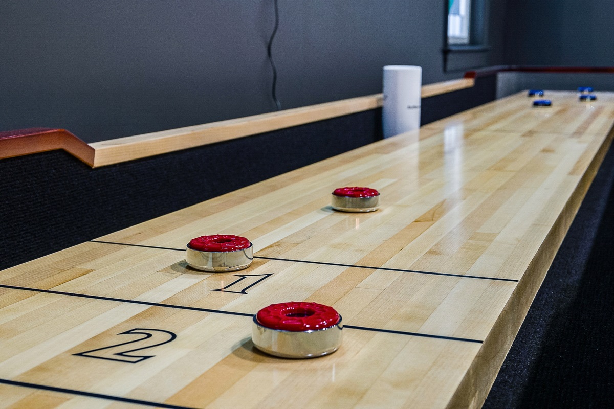 Shuffleboard is ready for some friendly competition — perfect for grandparents teaching the kids a new game or late-night showdowns.
