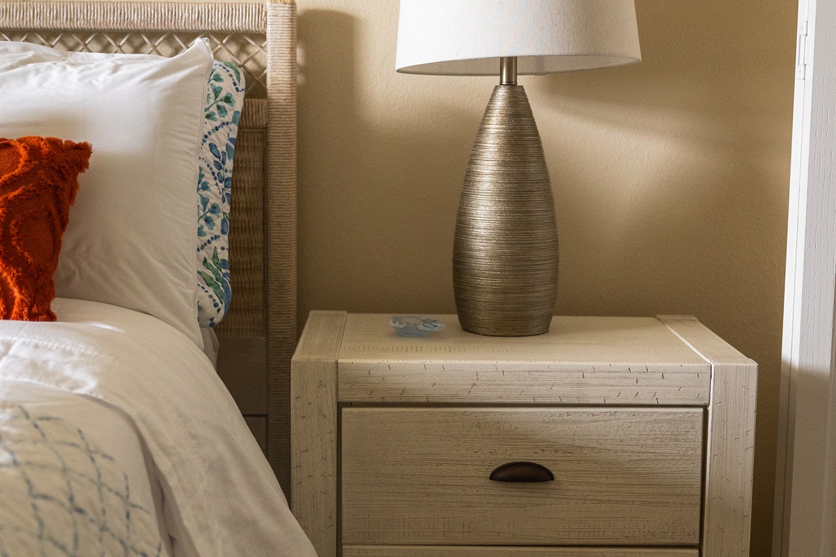 Bedside table with lamp and charger