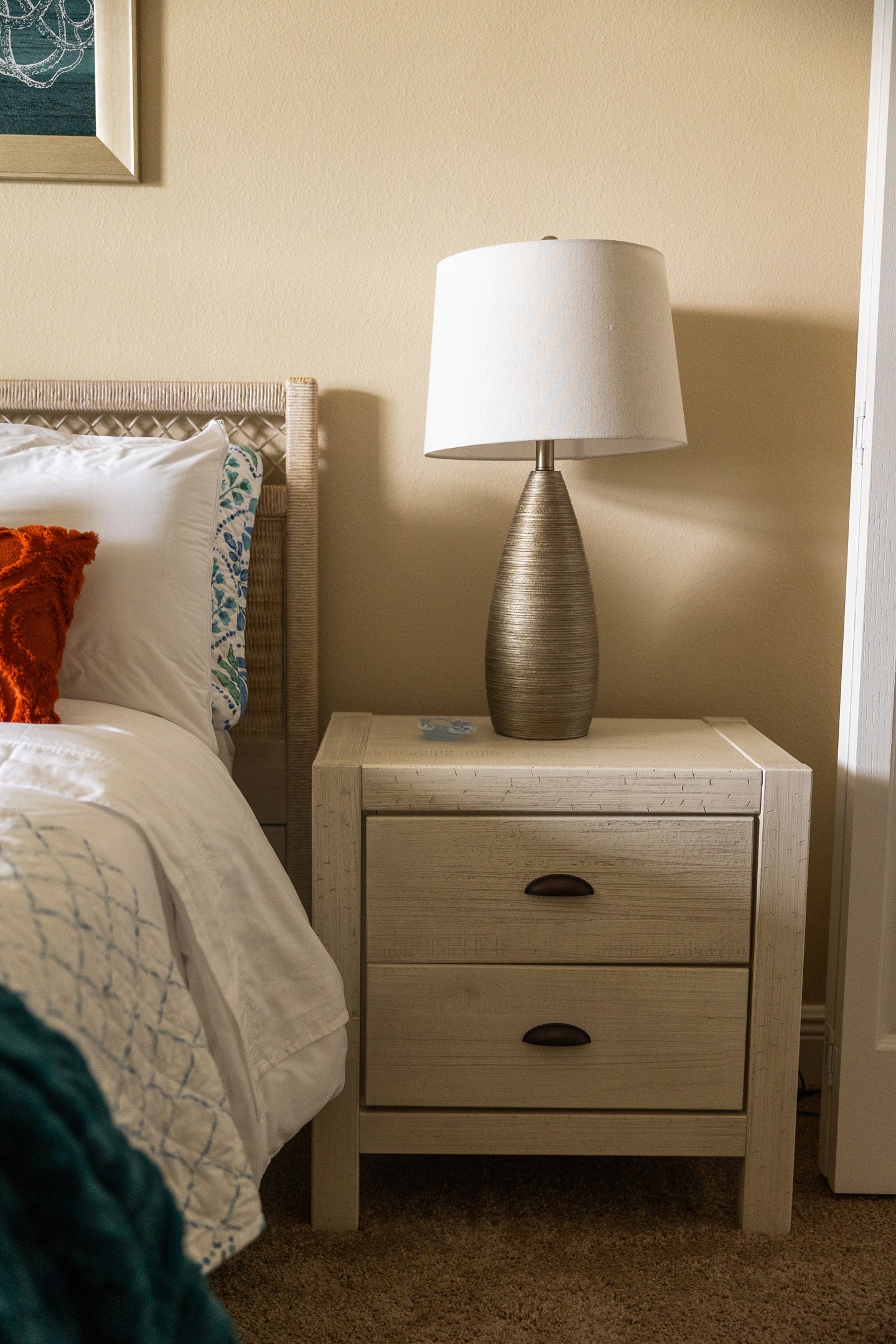 Bedside table with lamp and charger