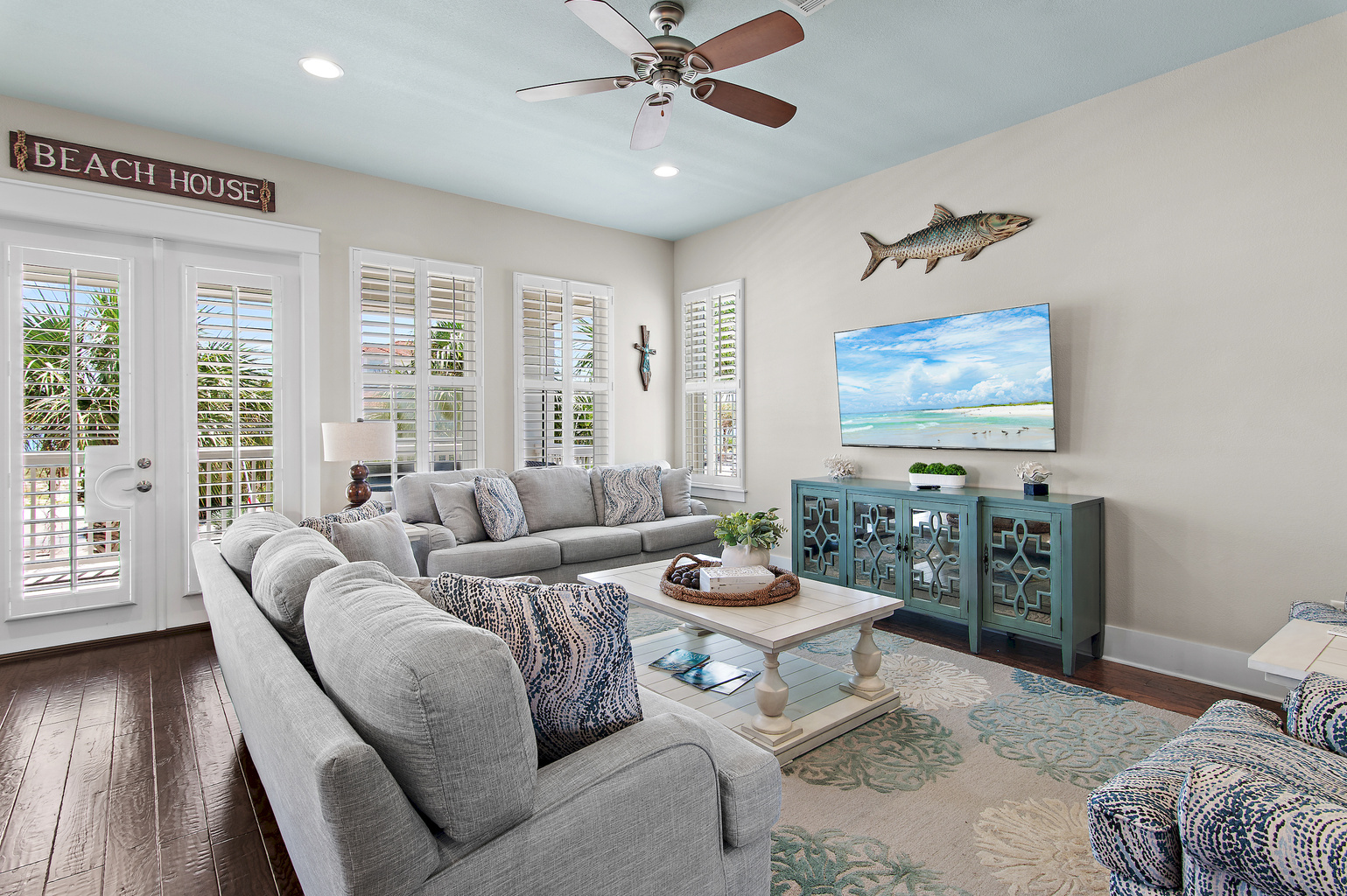Gather with family and friends in this spacious, inviting retreat with beautiful 30A charm.