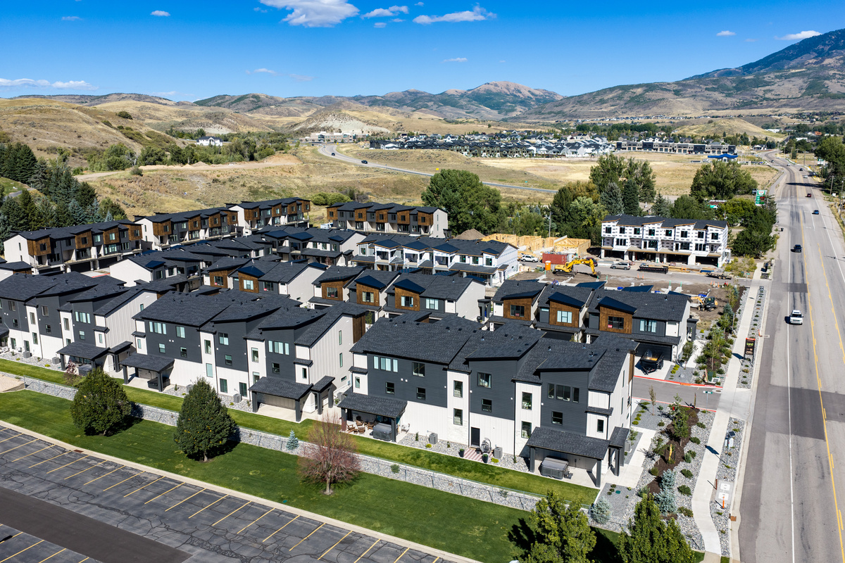 Aerial views showcase the neighborhood’s Mountain Green location and the beautiful landscape surrounding it.