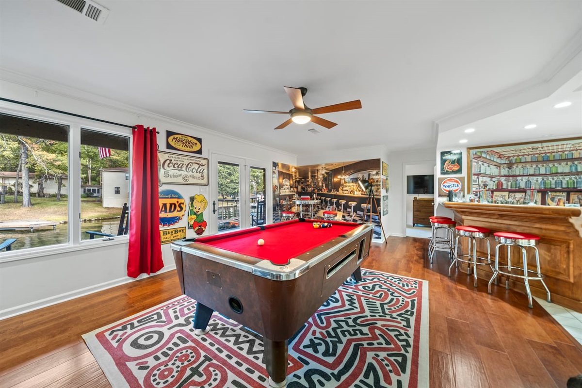 Enjoy a friendly game of pool while enjoying the lake views.