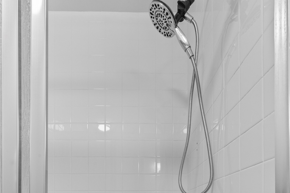 Shower Retreat: Refresh with a sleek and spacious shower, perfect for your rejuvenating escape!