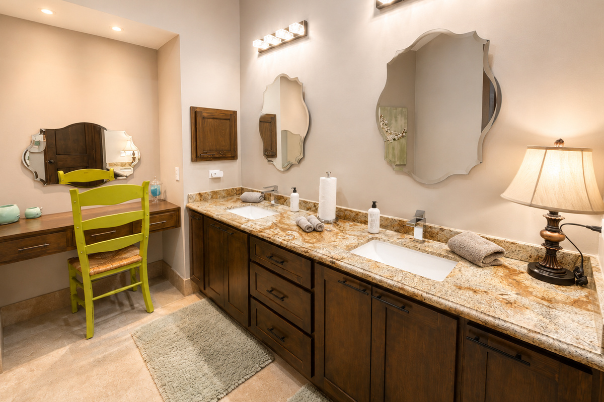 Casita 1:  The spacious en-suite bathroom includes a double vanity, a separate makeup vanity, and a large walk-in shower, creating a comfortable and private retreat.