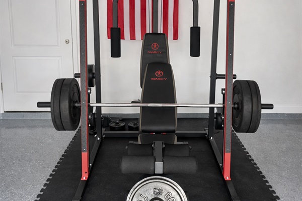 Stay active with a private gym and Marcy Smith Machine for full-body workouts.