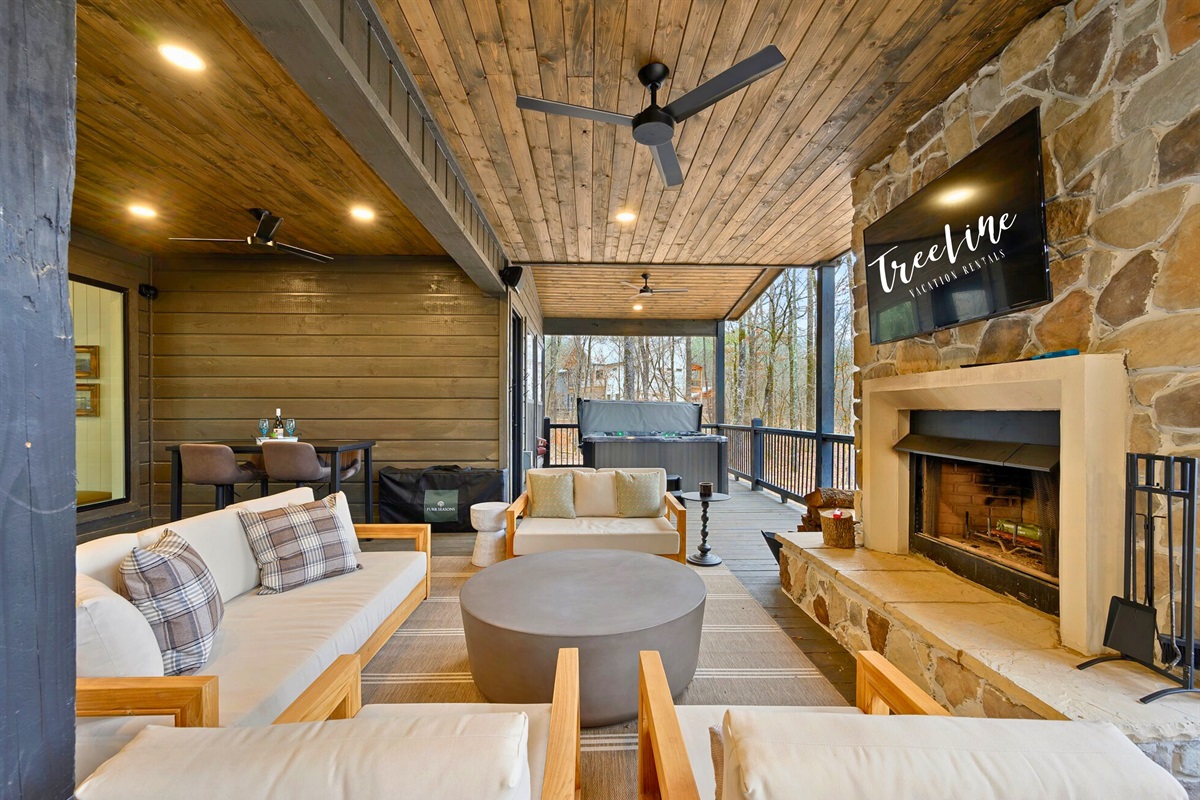This outdoor lounge feels like a second living room, complete with a fireplace and cozy seating for cool nights.