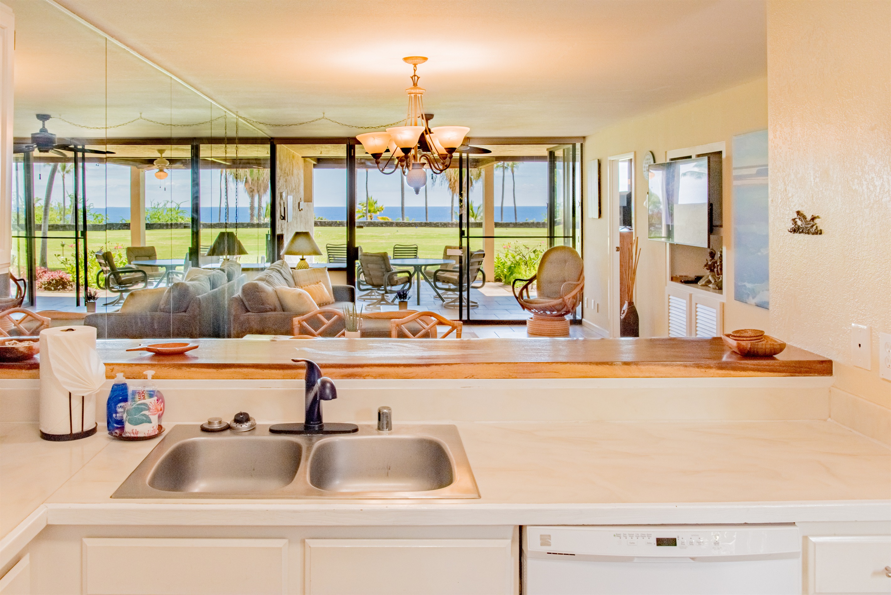 Enjoy the open living area and ocean view from the kitchen.