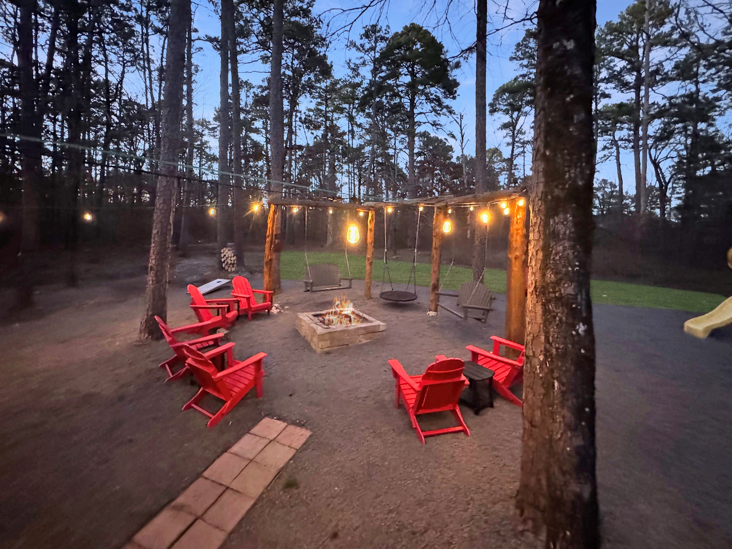 From sunrise coffee on the swing to sunset s'mores - this backyard has it all.