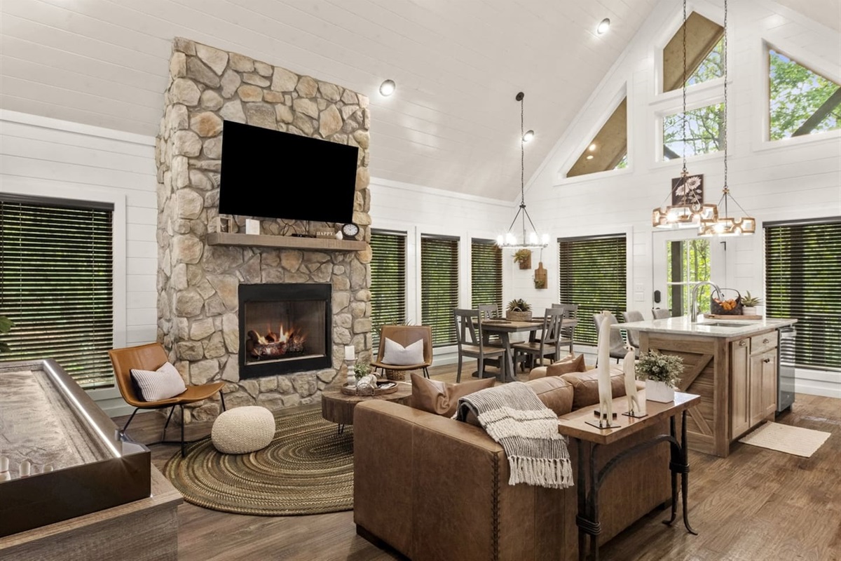 Gather with loved ones in a warm living room that feels like home from the moment you walk in.